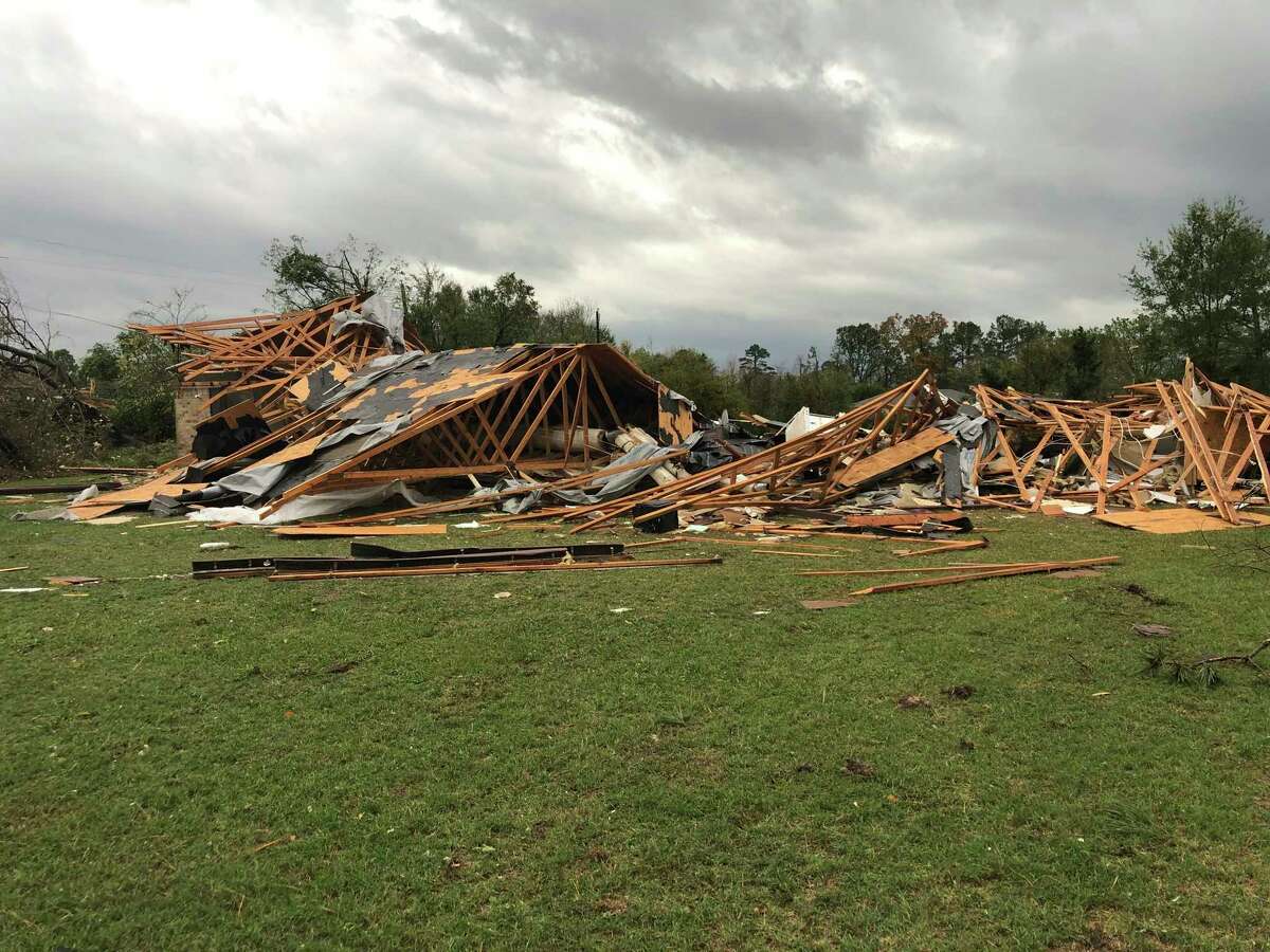 Scenes of devastation are visible in all directions along Lamar County Road 35940, west of State Highway 271, after a massive tornado hit the area, causing extensive damage and destroying an unknown number of homes, Friday, Nov. 4, 2022 in Powderly, Texas. (Jeff Forward/The Paris News via AP)