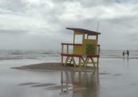 Texas surfers take advantage of tropical storm conditions to hit the waves