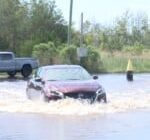 Battleship North Carolina parking lot sees flooding in aftermath of Idalia