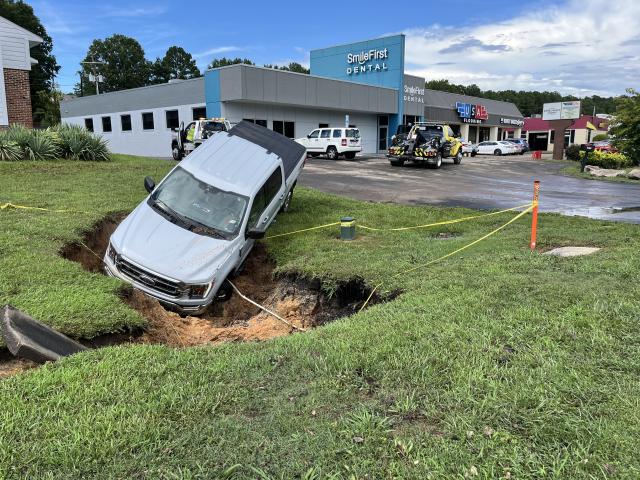 Crews were on the scene of a truck that ended up in a ditch due to flooding on 15-501 in Durham Monday afternoon. 
