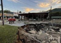 Hot Springs residents struggling to clear storm damage with one of the few roads remaining open