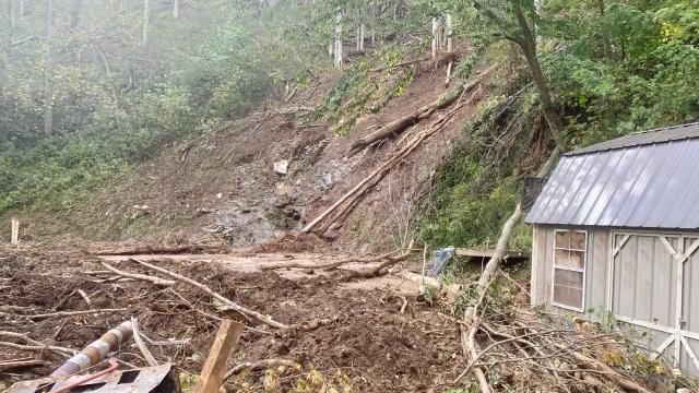 The mudslide swept the home of Jamie and Melissa Guinn into a river.