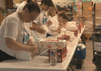 UNCW students honor Hurricane Florence anniversary at diaper bank